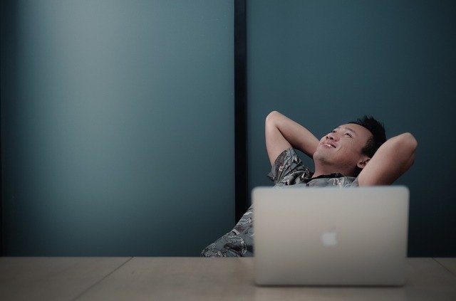 Teaching Resources: man relaxing with laptop